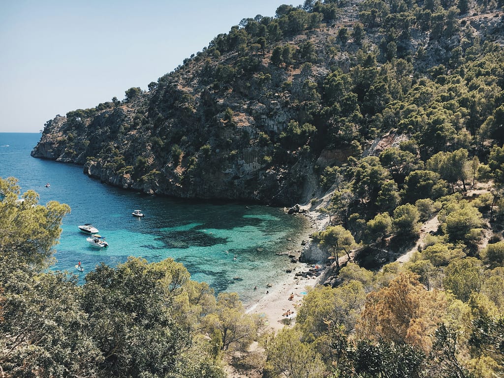 Quiet anchorage and cliff-backed beach on the island’s northwest | The AgencyRE Mallorca
