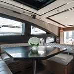 008-TROUBADOUR-65-Sea-Ray-Salon-Dining-Looking-Aft-42-BEK93Gpl
